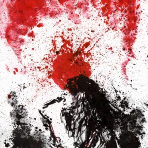 Long-haired musician performing with a guitar surrounded by heavy abstract red paint clouds and black ink splatters.